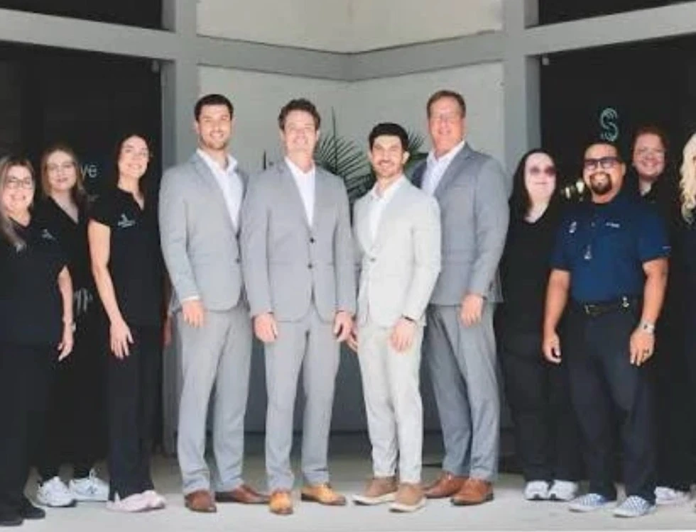 The Smith Eye Associates team gathered outside their Ponte Vedra Beach office